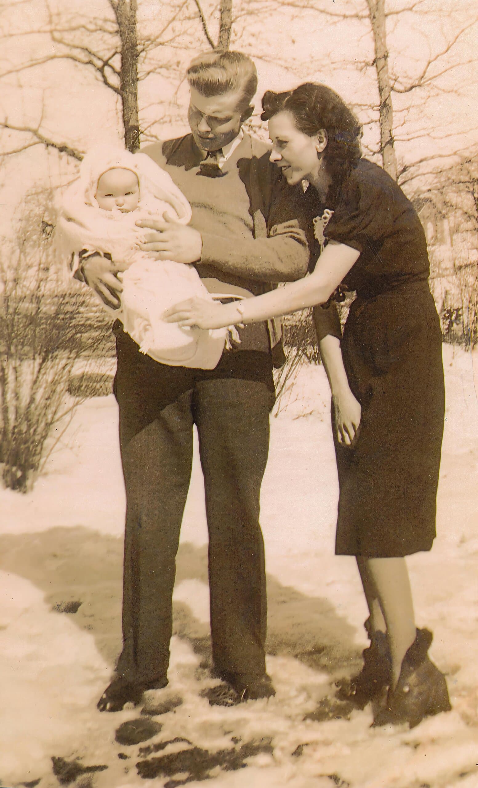 old photo couple holding baby old photo couple holding baby